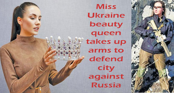 Miss Ukraine beauty queen takes up arms to defend city against Russia